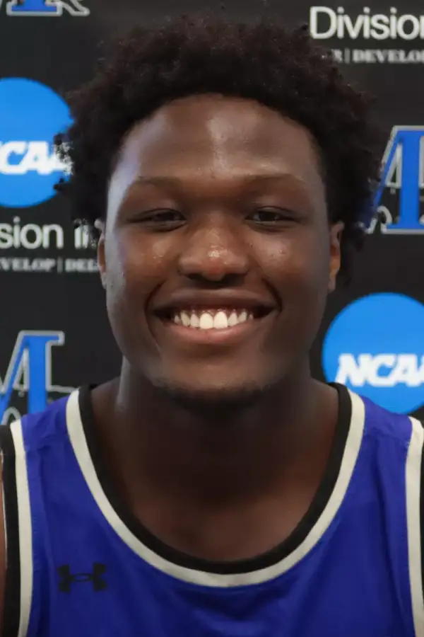 Andrew Ayeni, Basketball, Marian University