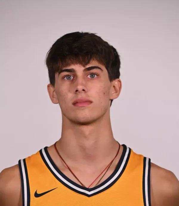 Max Justic, Basketball, Dominican University