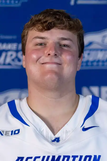Travis Wells, Football, Assumption University