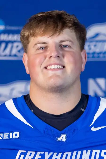 Charley Krygowski, Football, Assumption University